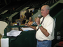Guy Warner, horse show competition announcer, announcing in the Lee and Rose Warner Coliseum, Minnesota State Fair