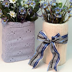 Dress up a glass or vase with a sweater sleeve cozy!