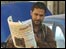 An Iraqi newspaper salesman