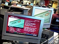 A plasma screen showing a digital text story
