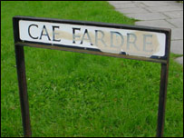 A vandalised street sign on the estate
