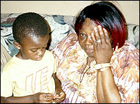 Garfield (left), pictured with his grandmother, is enrolled in HIV drug trials