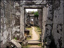 A path leads through a series of stone doorways at Preah Vihear